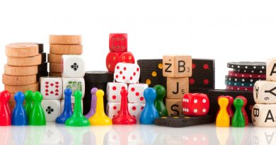 dice and game pieces colorful stock photo