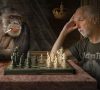 pensive man and monkey playing chess